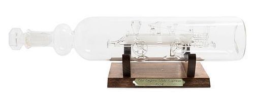 A Spanish Blown Glass Model of a Locomotive in a Bottle Width 11 3/4 inches.