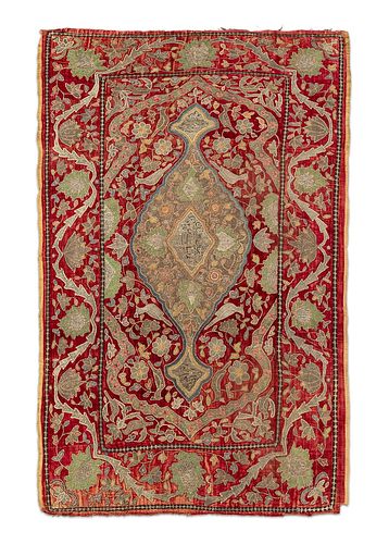 Three ancient fabrics embroidered with silk and silver threads on a red velvet background, Middle East
