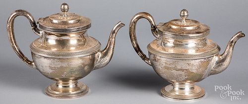 Two J.E. Caldwell sterling silver teapots