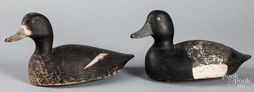 Two carved and painted duck decoys.