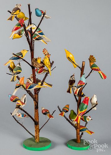 Two contemporary carved and painted bird trees