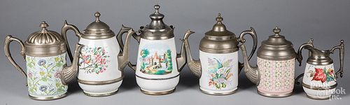 Five graniteware tea and coffee pots, etc.
