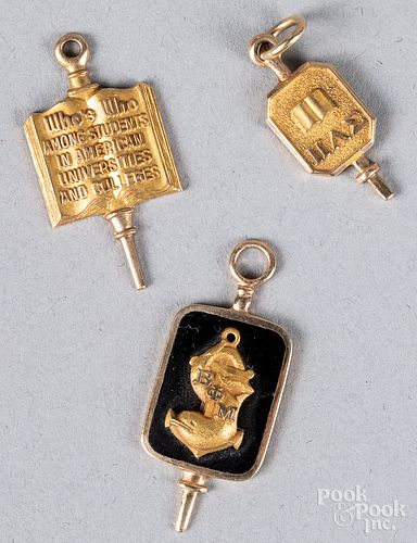 Three 10K gold and enamel pendants