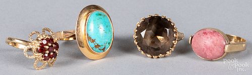 Four 14K gold and gemstone rings, 13.5 dwt.