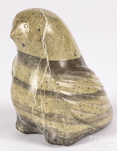 Inuit carved stone bird, together with a weaving