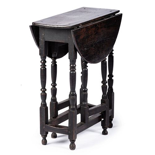 A William and Mary Black Painted Oak Gate-Leg Table, English, Circa 1700