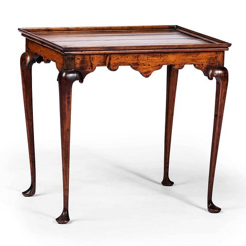 A Queen Anne Cherrywood and Maple Plank and Tray-Top Tea Table, New England, Circa 1750 with alteration