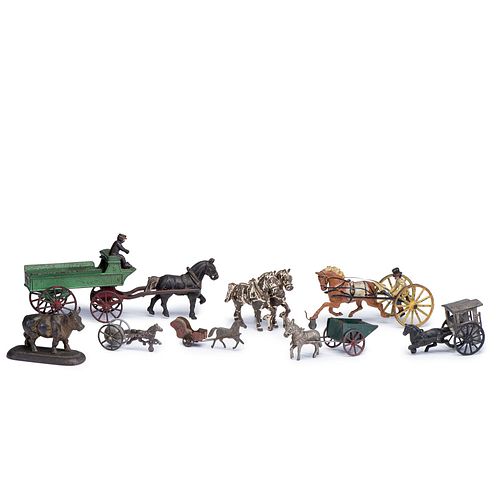 Eight Cast Iron and Pressed Tin Horse Drawn Toys
