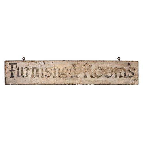 A Wooden Sign in Old Paint Advertising Furnished Rooms