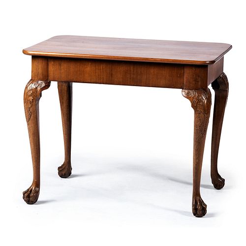 A Chippendale Style Carved and Figured Mahogany Hairy Claw Foot Side Table