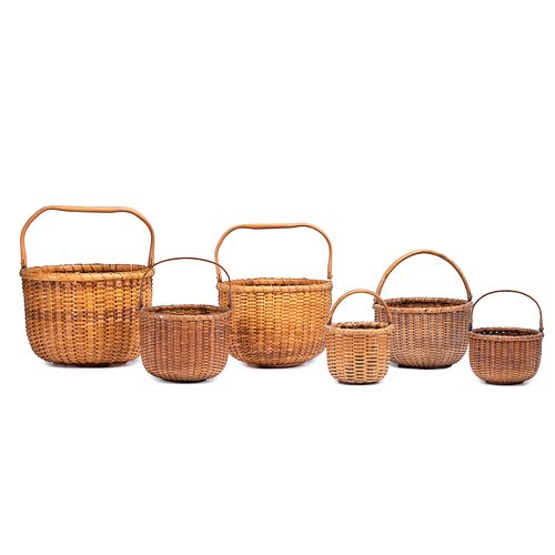 Six Nesting Woven Nantucket Baskets with Swing Handles