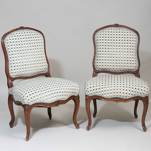 Two Louis XV Style Stained Oak Chaises