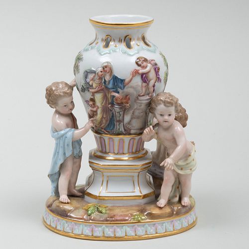 Meissen Porcelain Figure Group of Putti and a Classical Vase