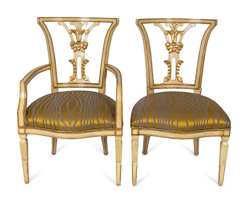 A Set of Ten Neoclassical Style Parcel-Gilt and Painted Dining Chairs
Height 37 1/2 x depth 20 1/2, armchair width 25 and side chair width 24 inches.