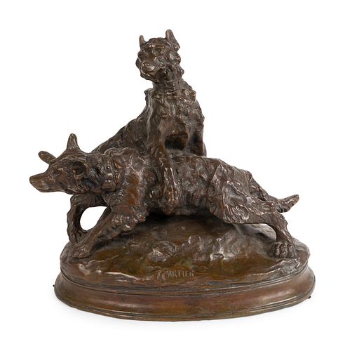 A French Patinated Bronze Group of Dogs
Height 15 x length 16 x width 8 1/2 inches.