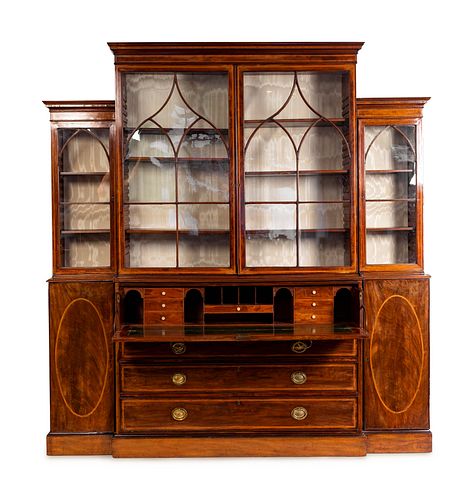 A George III Style Inlaid Mahogany Breakfront Secretary Bookcase
Height 85 x length 88 1/4 x depth 19 inches.