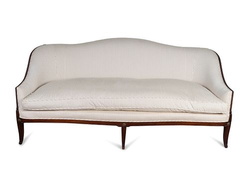 A George III Style Mahogany Camelback Sofa
Height 35 x length 78 x depth 28 1/2 inches.
