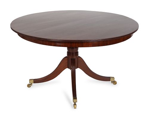 A Regency Mahogany Tilt-Top Breakfast Table
Height 28 1/2 x diameter 52 inches.