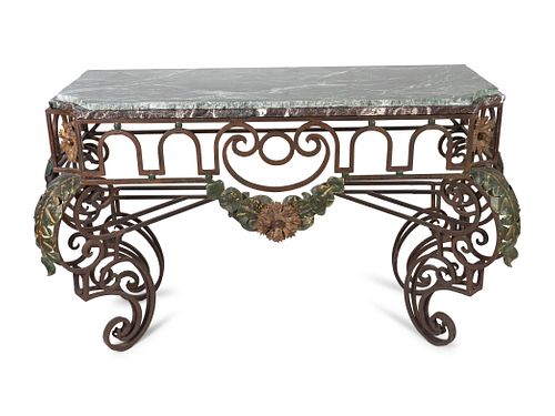 An Italian Rococo Style Wrought-Iron Console
Height 35 1/4 x width 59 x depth 22 inches.