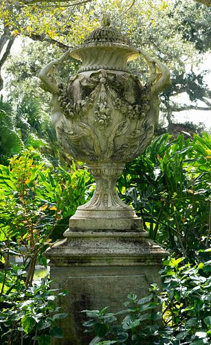 An English Monumental Carved Stone Urn on a Pedestal Base
Height 9 feet 8 inches x width 3 feet 5 inches.