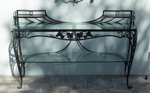 A Salterini Wrought Iron Two-Tier Serving Console
Height 53 x width 66 x depth 20 1/2 inches.