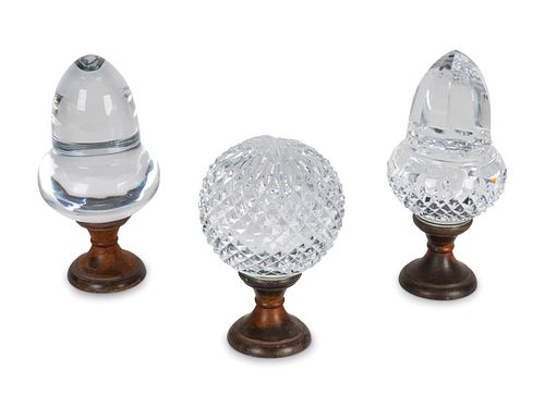 Three Molded Glass and BronzeBoules d'Escalier
Heights 6, 7 1/4 and 7 1/2 inches.