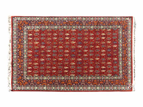 A Persian Boteh Design Wool Rug
8 feet 6 inches x 5 feet 4 inches.