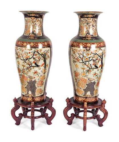 A Pair of Japanese Porcelain Palace Vases
Height 48 inches.