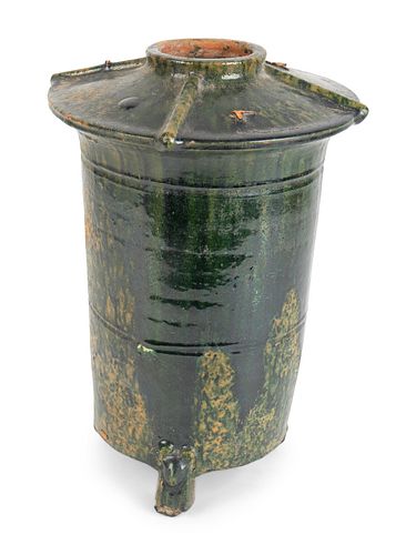 A Chinese Green-Glazed Terracotta Granary Model
Height 14 x diameter 9 1/2 inches.