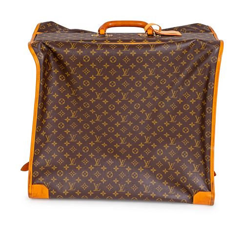 A Louis Vuitton Folding Soft Garment Bag
Dimensions closed: Height 20 x length 23 x depth 15 inches.
