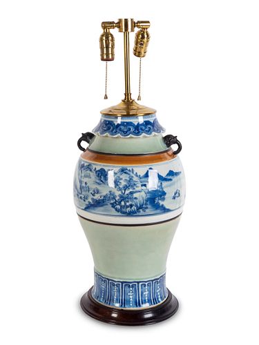 An Asian Blue and White Porcelain Vase
Height of vase, 17 3/4 inches.