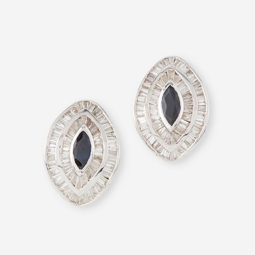 A pair of rhodium plated fourteen karat gold, sapphire, and diamond earrings,