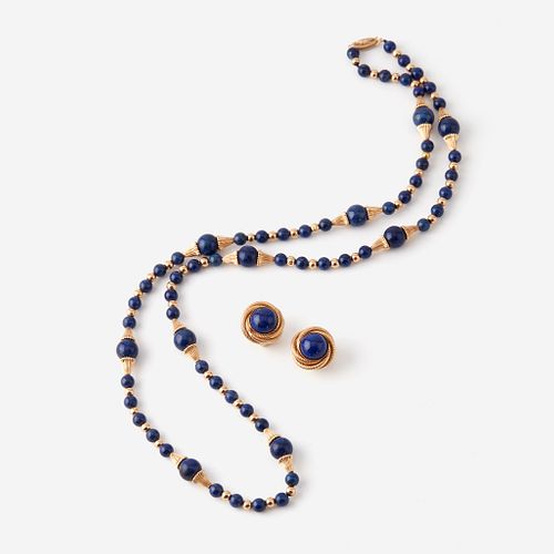 A fourteen karat gold and lapis lazuli necklace with matching earrings,