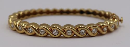 JEWELRY. 18kt Gold and Diamond Hinged Bracelet.