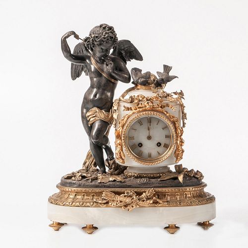 Gilt and Patinated Bronze-mounted Onyx Mantel Clock