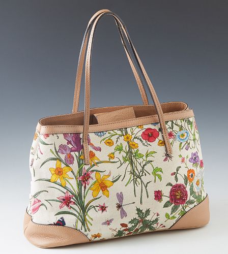 Gucci White MC Canvas Floral Shoulder Bag, with tan leather accents and magnetic closure, the interior of the bag lined in beige canvas with a side zi