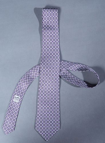 Hermes Men's Silk Tie, with an interlocking geometric motif on purple background, L.- 62 in.