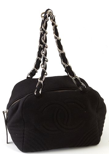 Chanel Black Canvas Logo Tote, c. 2004, with silver interlaced chain and black canvas handles, the interior of the bag lined in "CHANEL" black canvas,