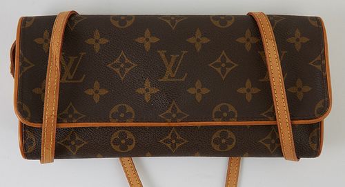Louis Vuitton Monogram Coated Canvas GM Twin Shoulder Bag, the flap opening to a beige suede interior with one pocket, the vachetta leather strap with