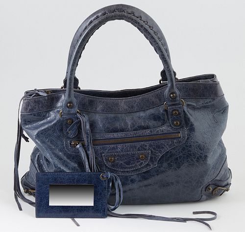Balenciaga Dark Blue Distressed Leather Chevre Purse Shoulder Bag, the exterior with aged brass hardware and a front zip compartment with a long leath
