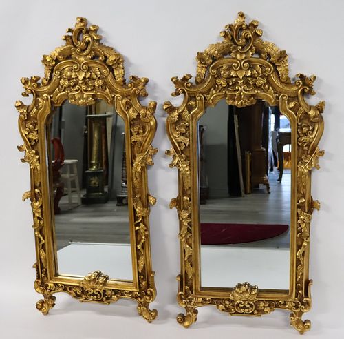 A  Large Pair Of Louis XV Style Carved Giltwood