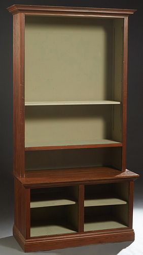 Cypress Bookcase, 20th c., the stepped crown over a top with beaded board sides and adjustable shelf standards, on a beaded board base with open adjus
