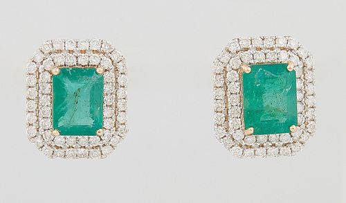 Pair of 14K Yellow Gold Stud Earrings, each with a 1.76 ct. emerald atop a double concentric graduated border of round diamonds, total emerald wt.- 3.