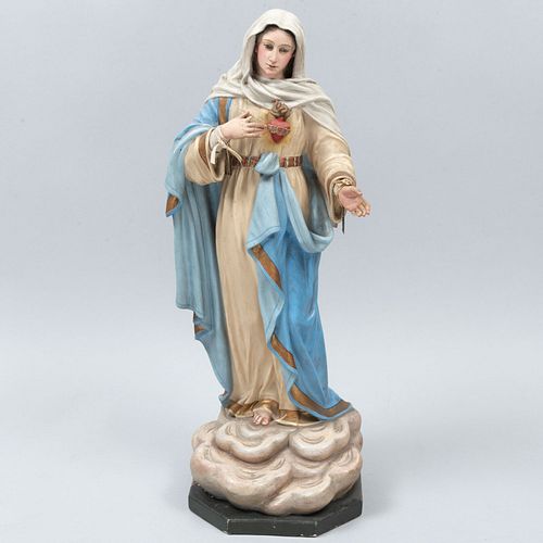 Virgen del Sagrado Corazón. Siglo XX. Elaborada en aglomerado estucado y policromado. Con manos y corazón removibles.