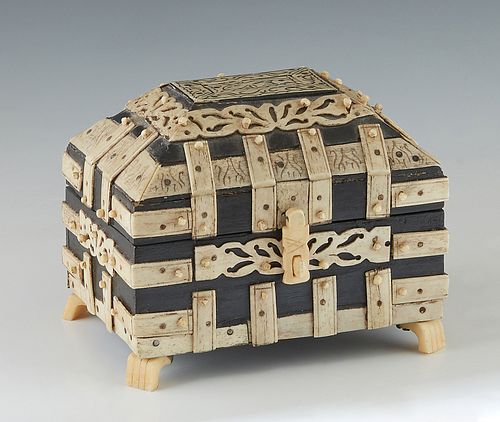 Indian Bone Overlaid Wooden Dresser Box, early 20th c., of sarcophagus form, the sloping lid with a central rabbit incised plaque, the top and sides w