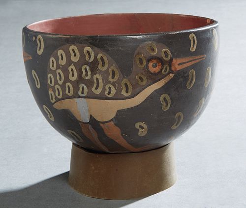 Nazca Fired, Painted and Glazed Terracotta Bowl, c. 200-500, Peru, depicting three spotted birds with red legs and beaks on a like-spotted charcoal gr