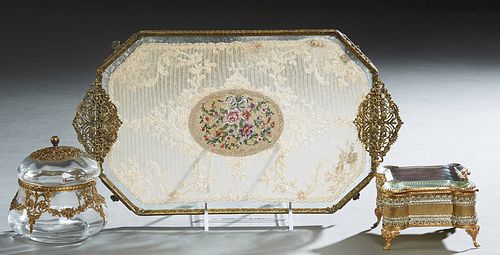 Group of Three Lady's Dresser Items, early 20th c., consisting of a brass and glass ring box with a tufted silk interior; a brass filigree mounted gla