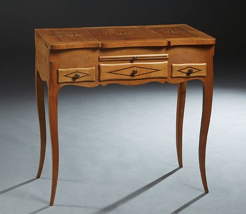 French Louis XV Style Inlaid Carved Cherry Dressing Table, 20th c., the serpentine top with a central lifting lid with a mirror, over interior storage