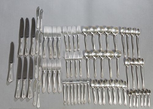Seventy Piece Set of Sterling Flatware, by Watson, in the "Navarre" pattern, 1908, consisting of 8 iced tea spoons, 8 butter spreaders, 8 seafood cock