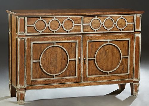Santa Maria Carved Mahogany Sideboard, 21st c., the rectangular top over two large frieze drawers with applied silvered geometric decorations, above d